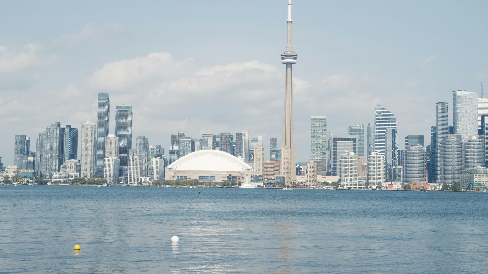 Toronto skyline with the CN Tower and Rogers Centre across Lake Ontario